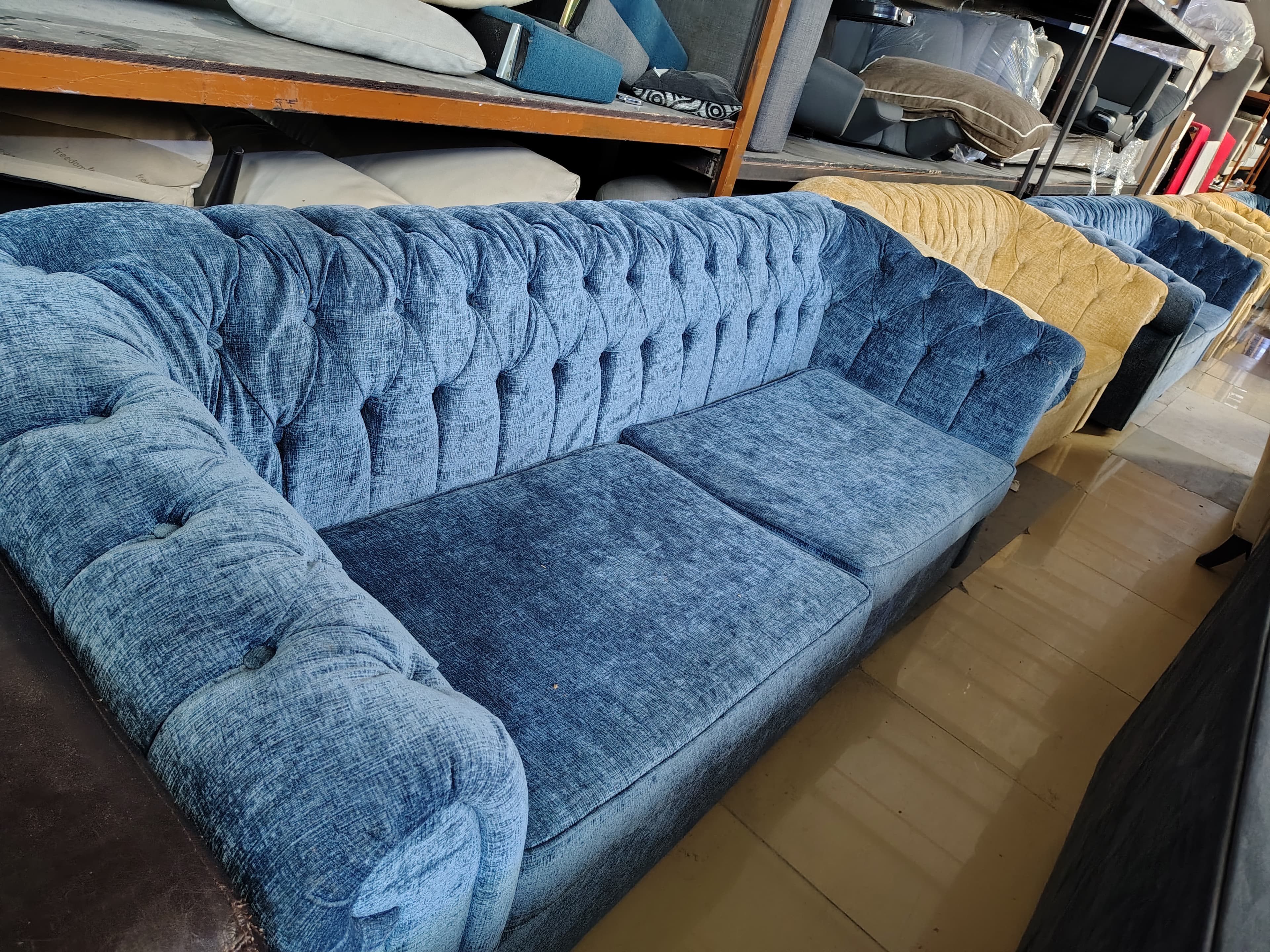 Blue Tufted Sofa
