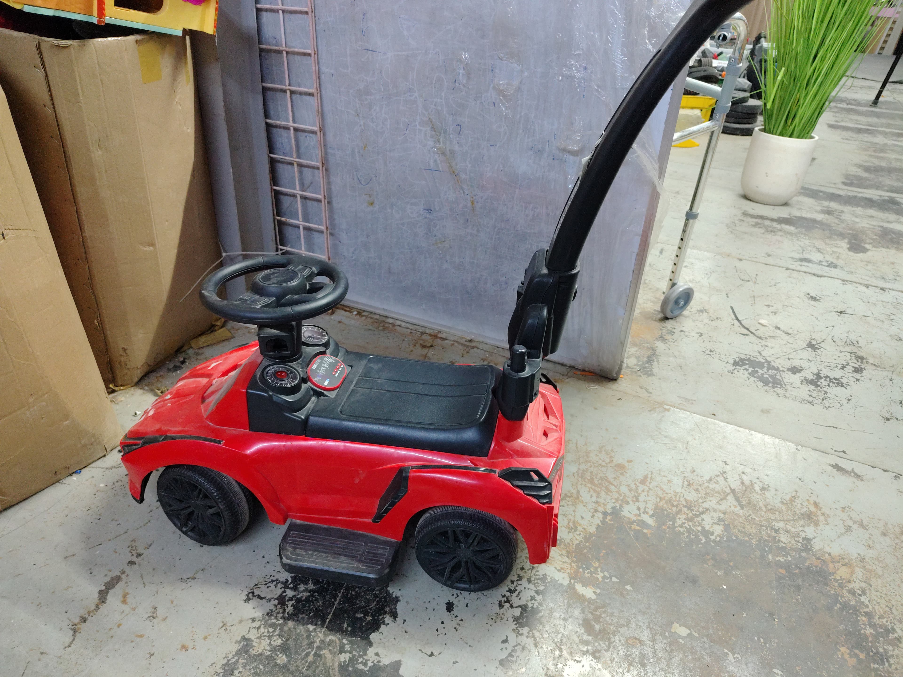 Red ride-on car with parent handle 2